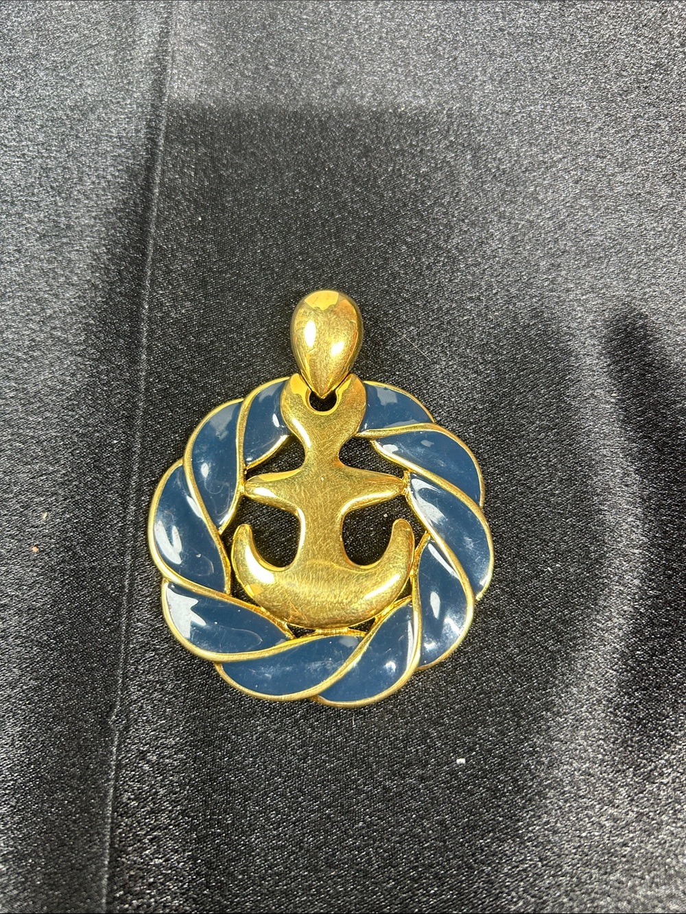 Vintage Napier Gold-Tone anchor pendant features blue enamel detailing